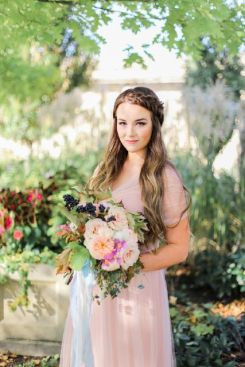 A romantic garden wedding in the Pantone Colors of the Year for 2016, Rose Quartz and Serenity. Delicate pastel colors combined with an ethereal wedding dress and stunning garden florals!